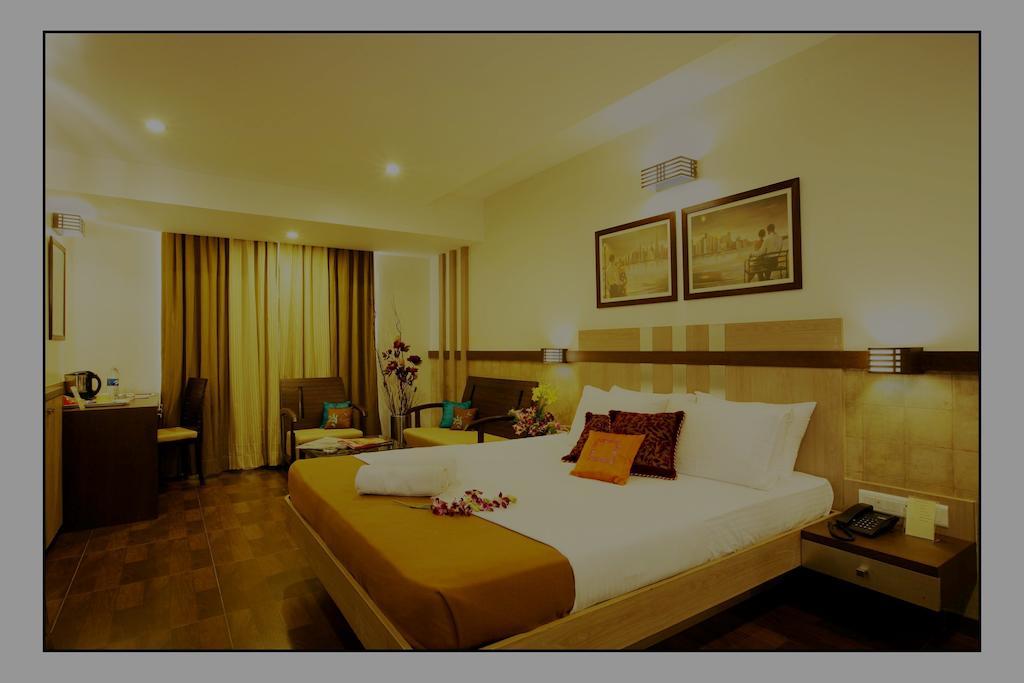 Hotel Utsav Deluxe ปูเน่ ห้อง รูปภาพ